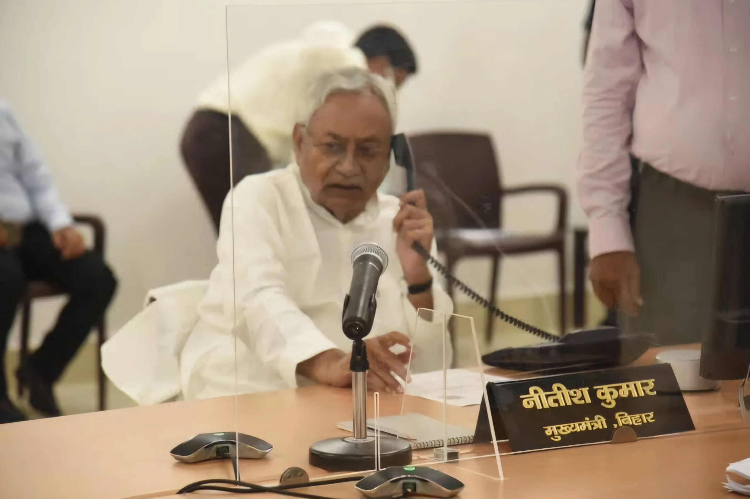 Nitish Kumar on phone scaled